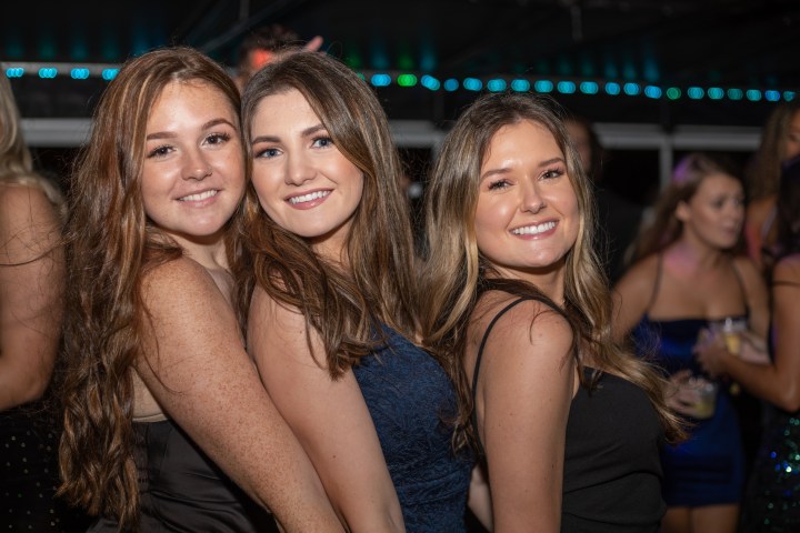 a group of people posing for the camera