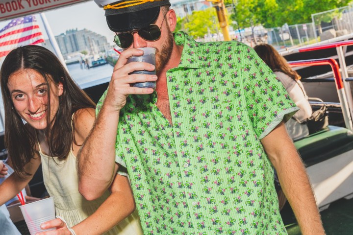 a group of people standing next to a person