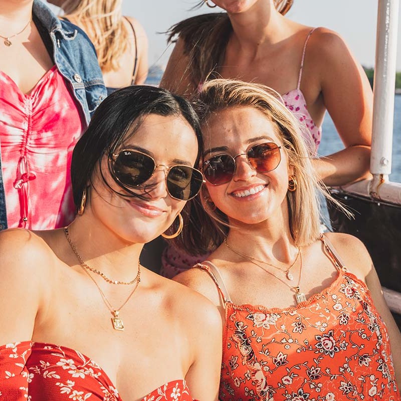 a couple of people that are standing in the water