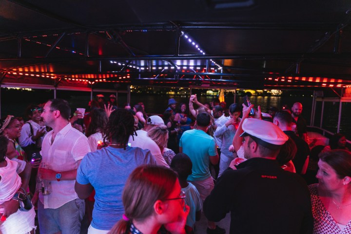 a group of people standing in front of a crowd