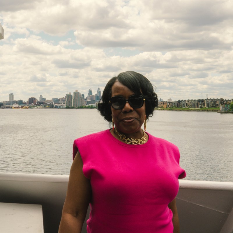a person standing in front of a body of water
